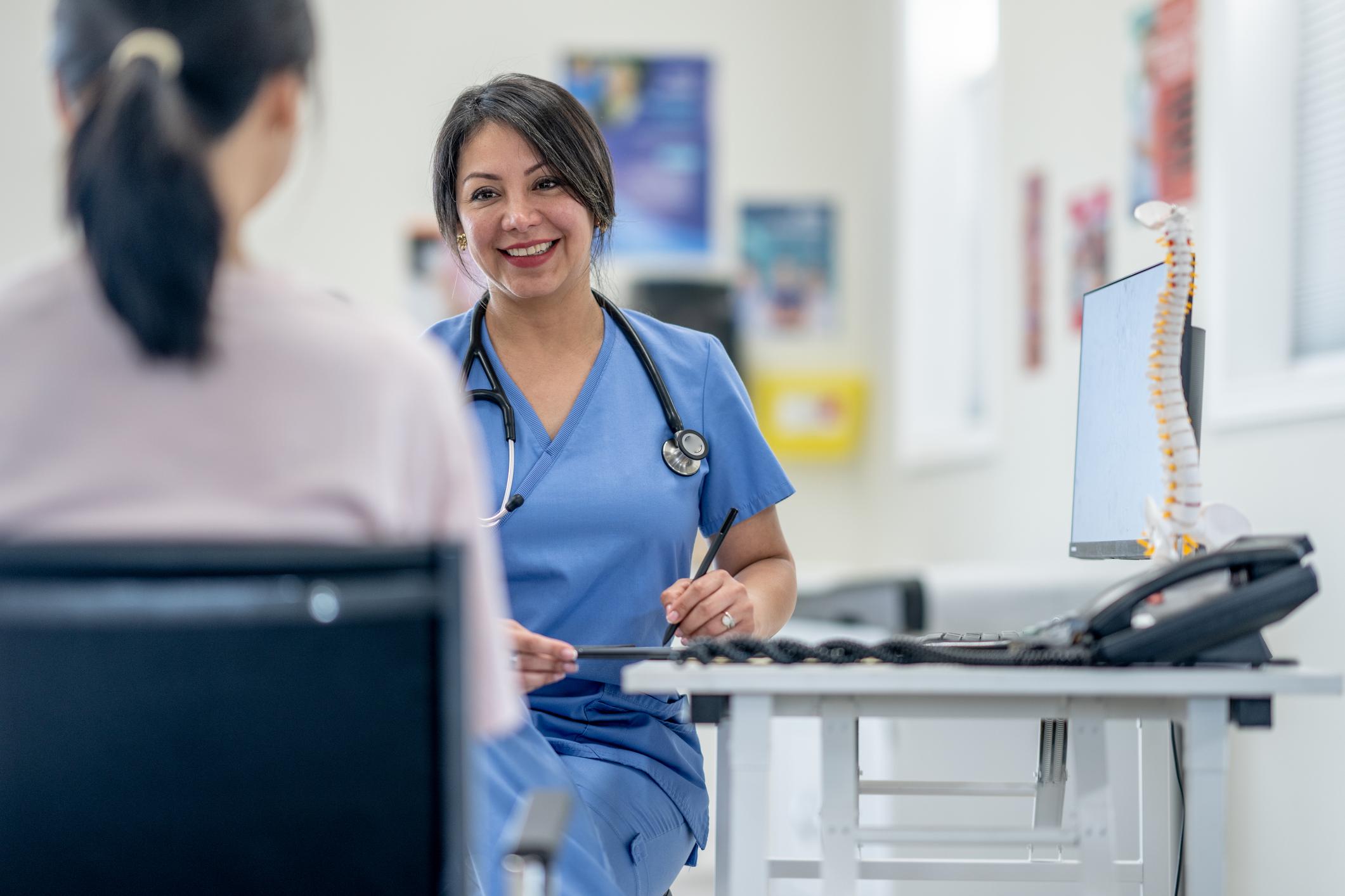 Nurse talking to a patient